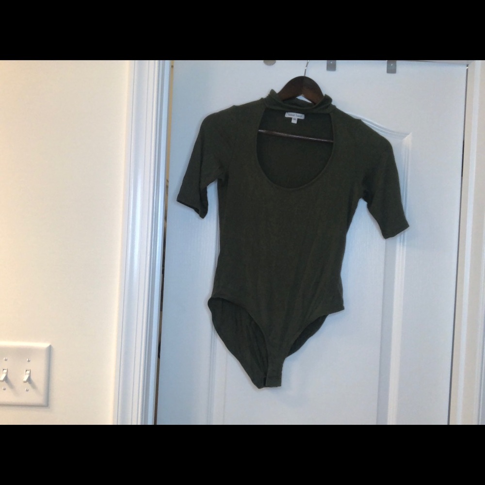 Green open next body shirt.